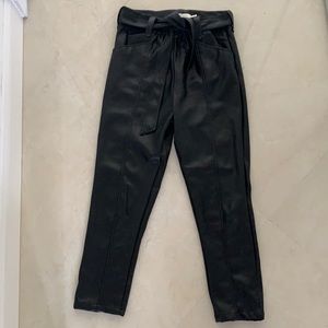 Black leather pants that are stretchy